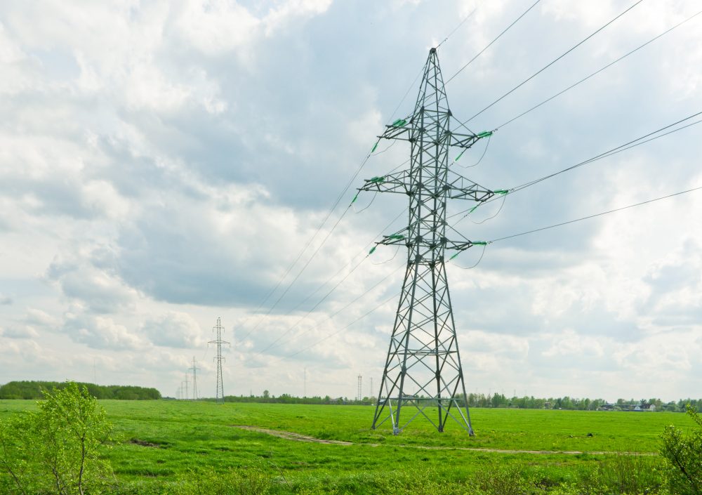 Transmission lines running through a field