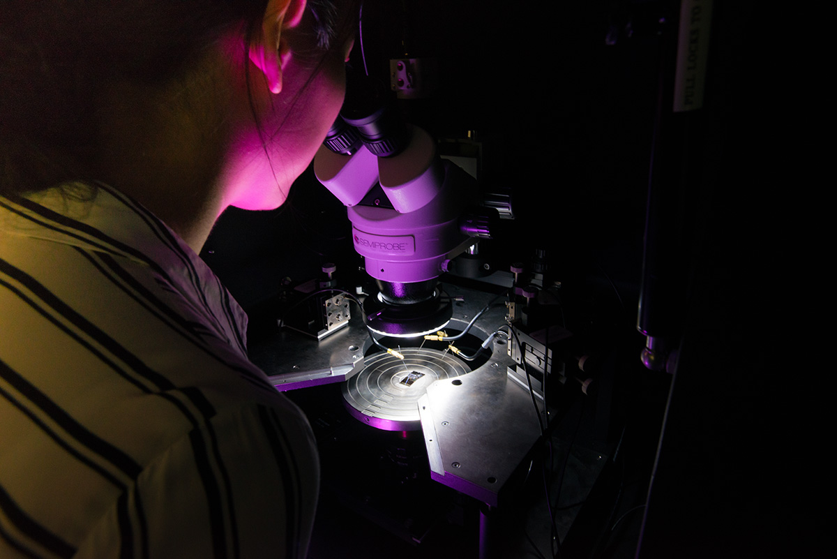 Laboratory scientist inspecting a cell