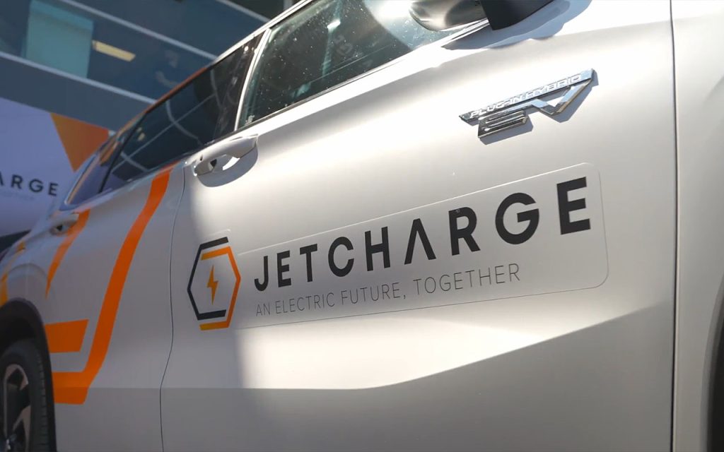 Feature image of an electric vehicle (EV) with JET Charge logo